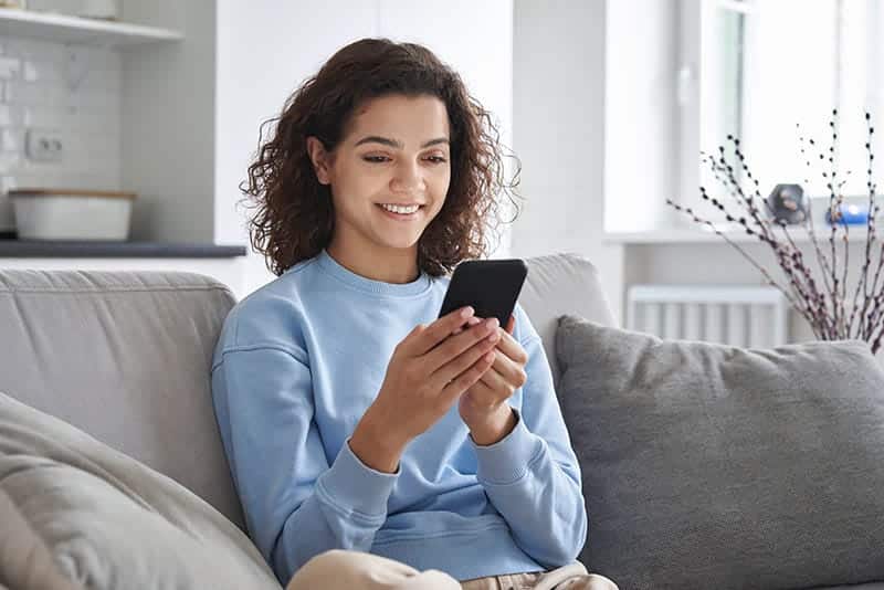 woman looking at cellphone