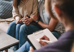 a group of people in a family therapy program