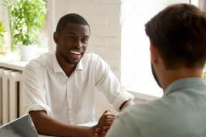 young man receiving information about mental health treatment