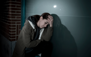 Young person thinking about commonly abused prescription drugs