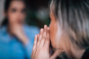 Woman holding hands close to face as she discusses her fentanyl addiction