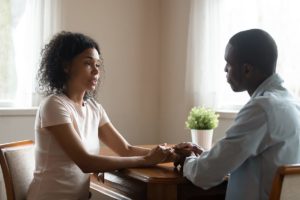 couple discussing the benefits of adderall addiction treatment