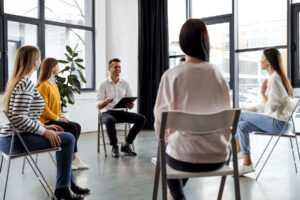 Group of People Discussing 5 Reasons to Consider a Drug Rehab