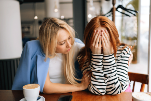 Two people talking about the signs your loved one is addicted to meth